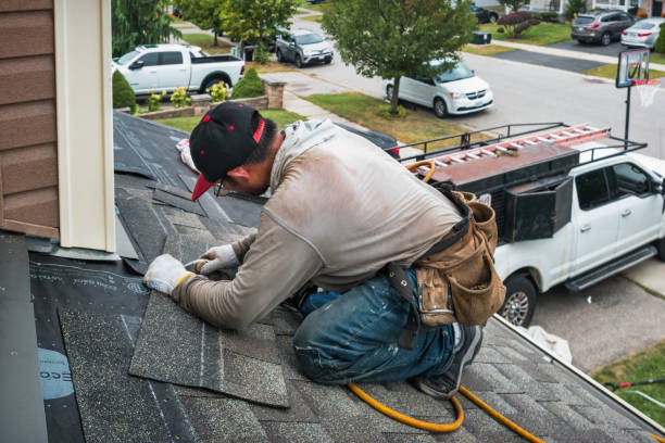 Professional Emergency Roof Repair technician working in Spring Glen, PA